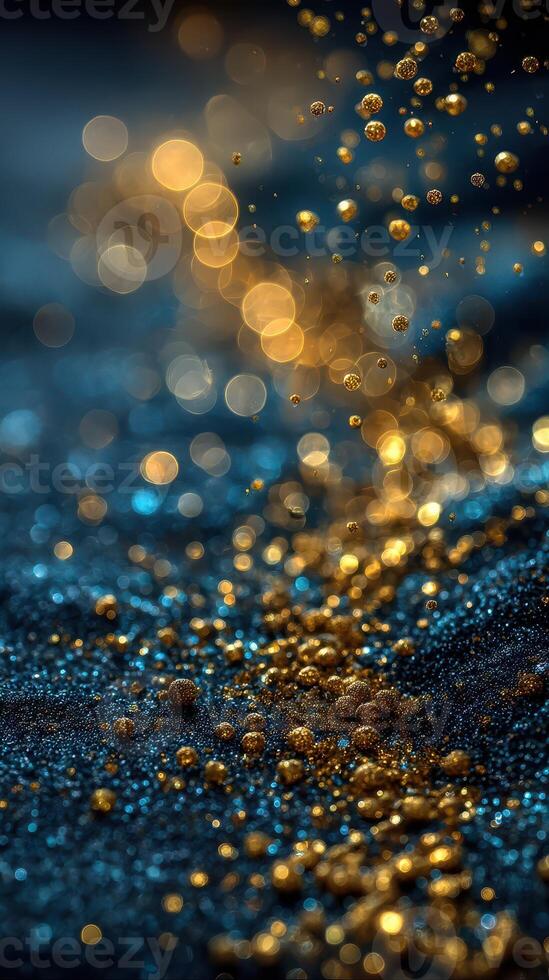 Golden particles shimmer above a deep blue surface during a dynamic display of light and texture photo