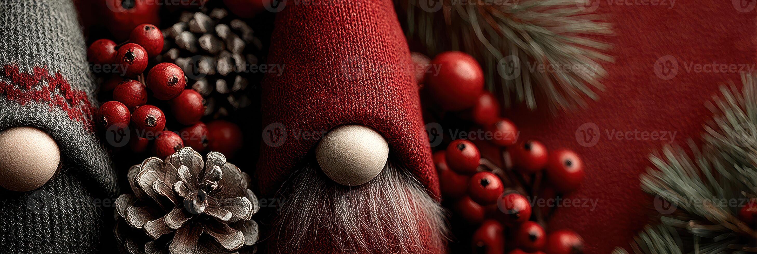 Festive gnomes in cozy red and gray tones surrounded by winter berries and pine cones during the holiday season photo