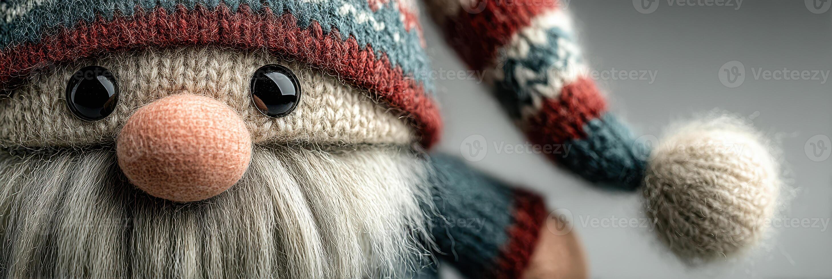 Festive knitted gnome with a colorful hat and fluffy beard ready for holiday celebrations photo