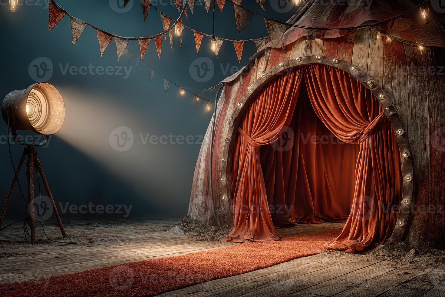 Entrance to an old circus tent with glowing lights and a spotlight during twilight photo