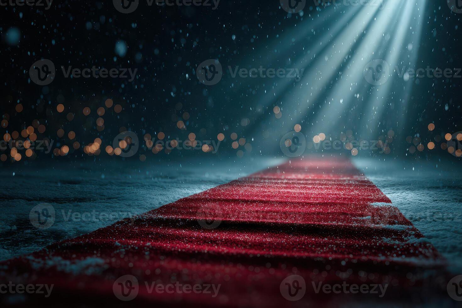 Red carpet leading into the spotlight during a snowy night gala event with blurred lights in the background photo