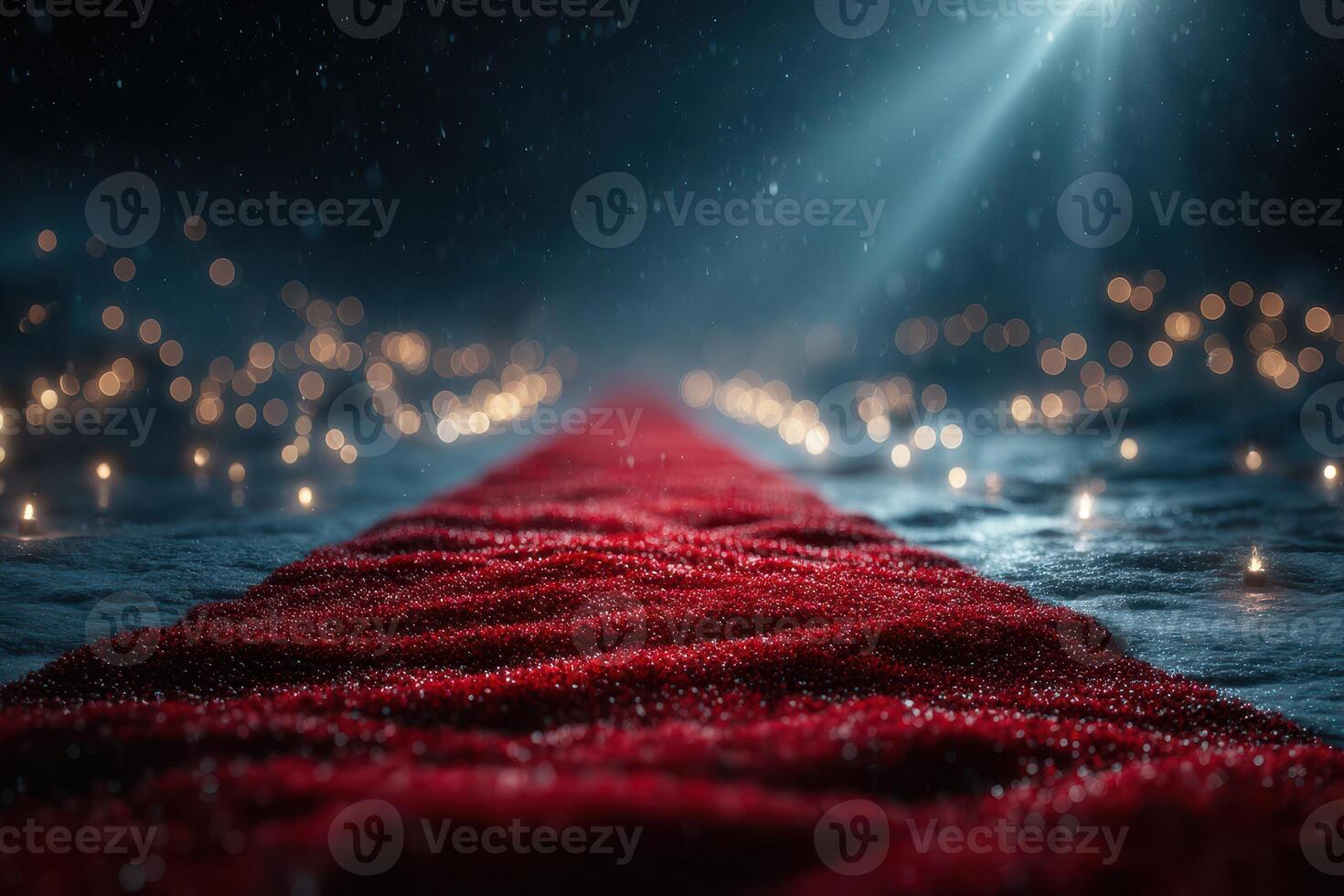 Red carpet leading to illuminated backdrop during nighttime event with sparkling lights photo