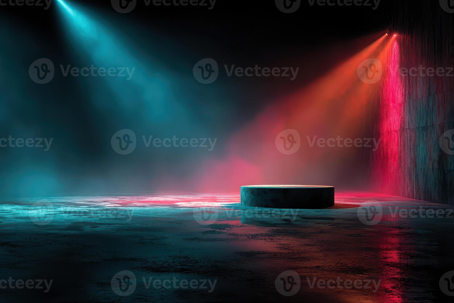 Lighting effects create a vibrant atmosphere in a dark, empty stage setting with a circular platform photo