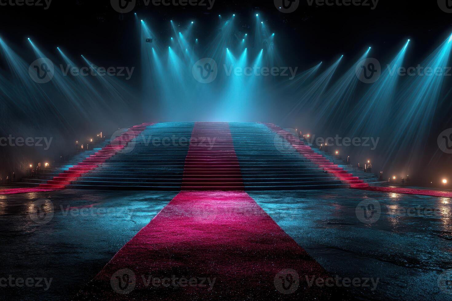 Dramatic stage setup with vibrant lighting and striking red carpet at an evening event photo