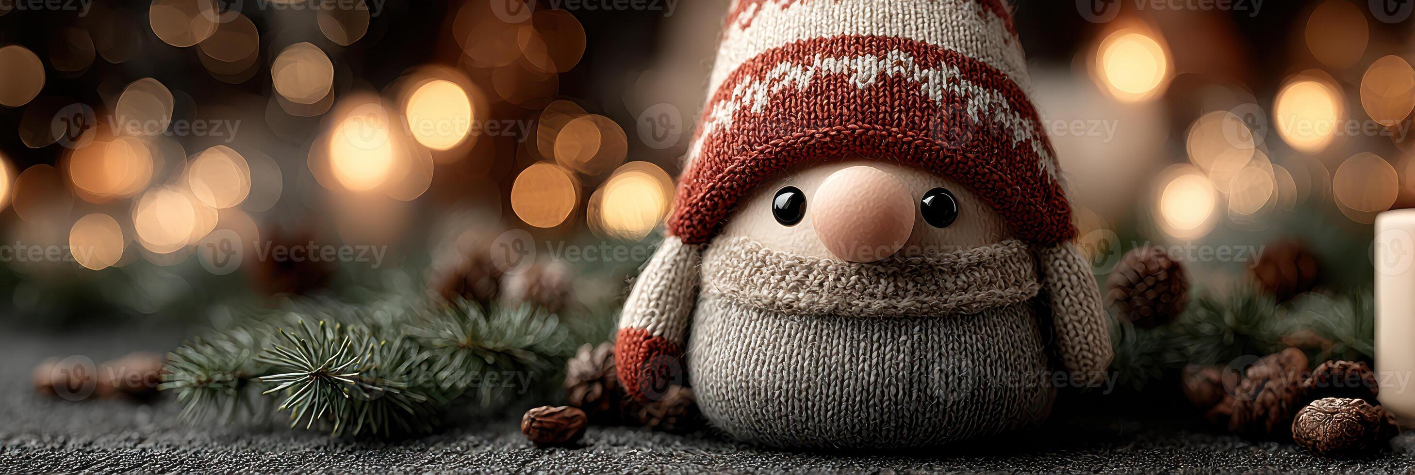 Cute holiday gnome decoration wearing a warm hat and scarf surrounded by festive lights and natural elements in winter setting photo