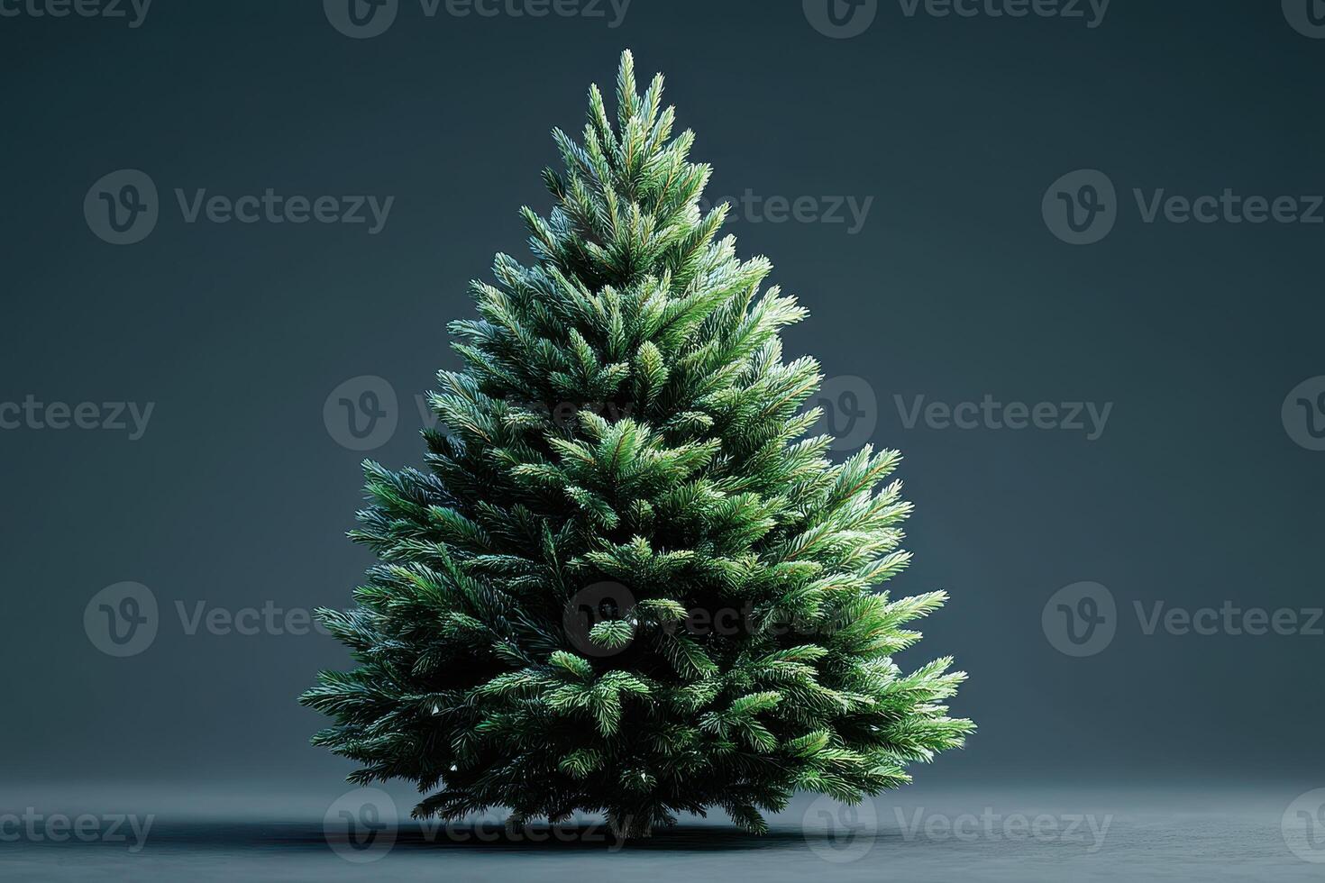 Artificial evergreen tree with lush branches set against a dark backdrop suitable for festive decorations during winter holidays photo