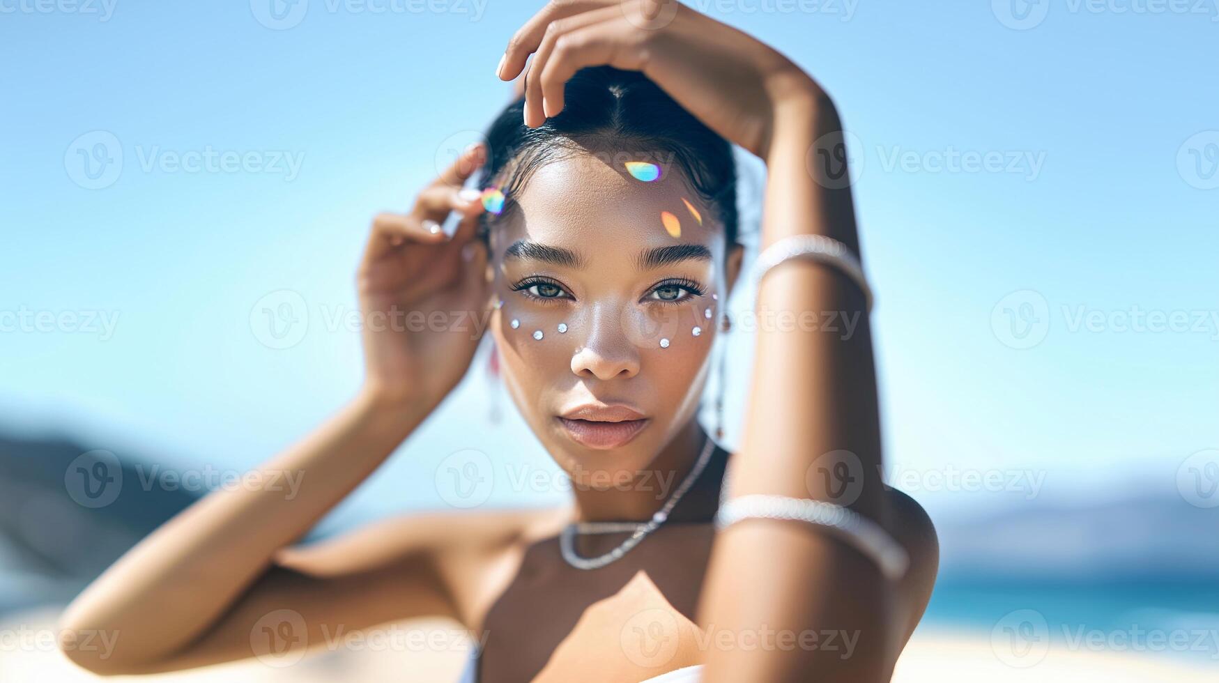 Youthful woman with holographic face gems under sunlight. Summer glow, mermaid vibes, festival look, radiant skin, beach style, playful sparkle, dreamy aesthetic. photo