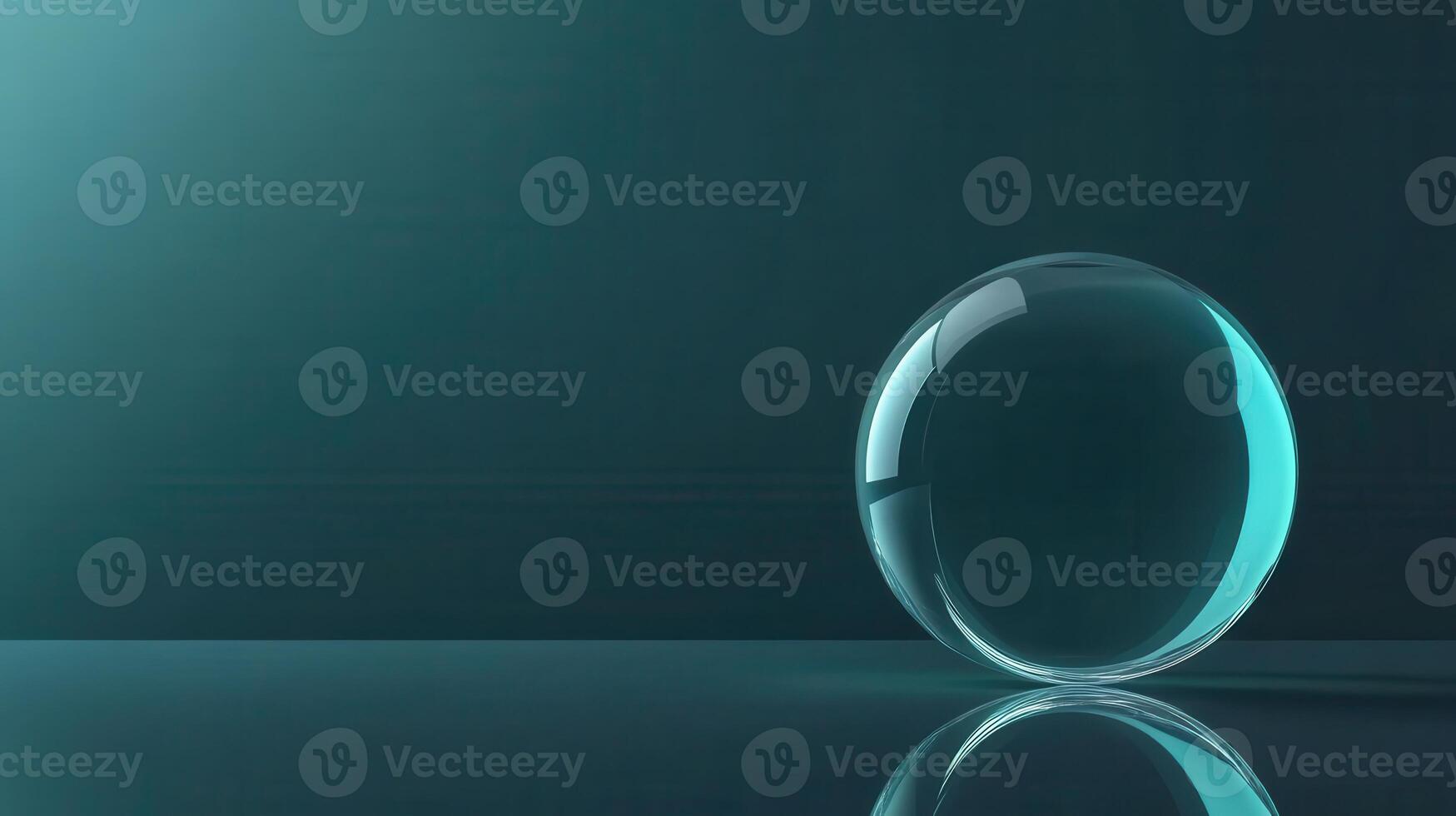 Transparent Glass Sphere Displaying Ambient Light and Reflections Against Teal Background photo