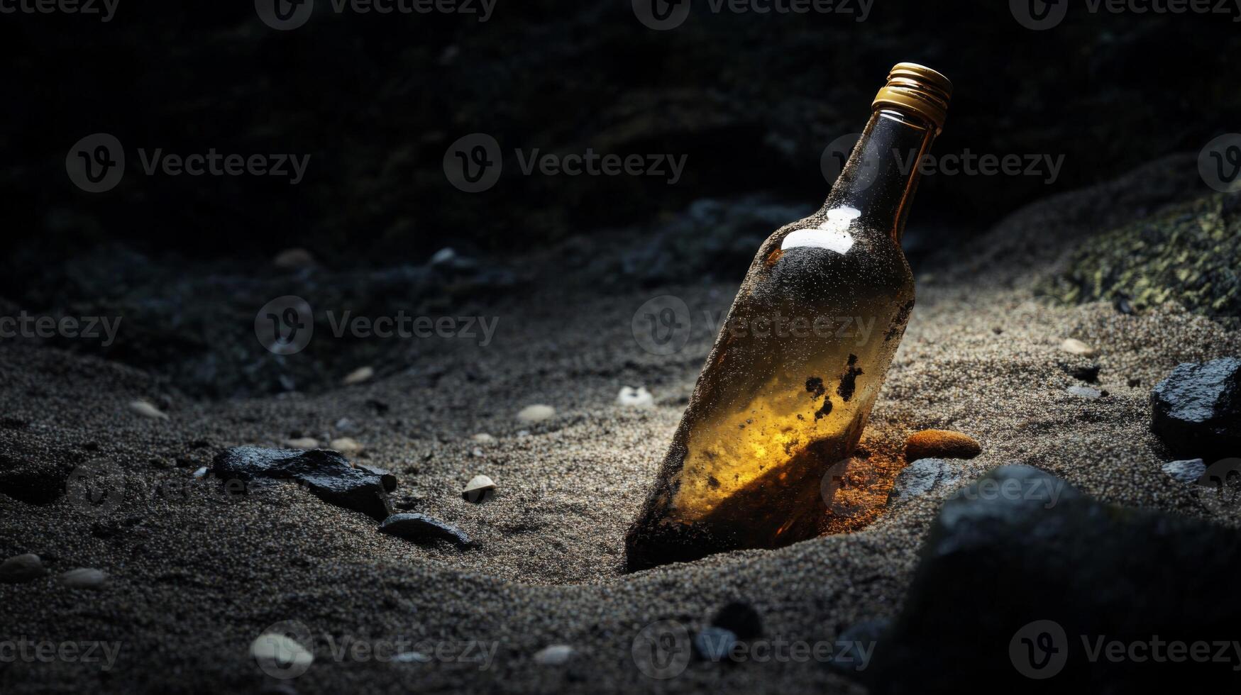 Dark Amber Glass Bottle Partially Buried in Beach Sand photo