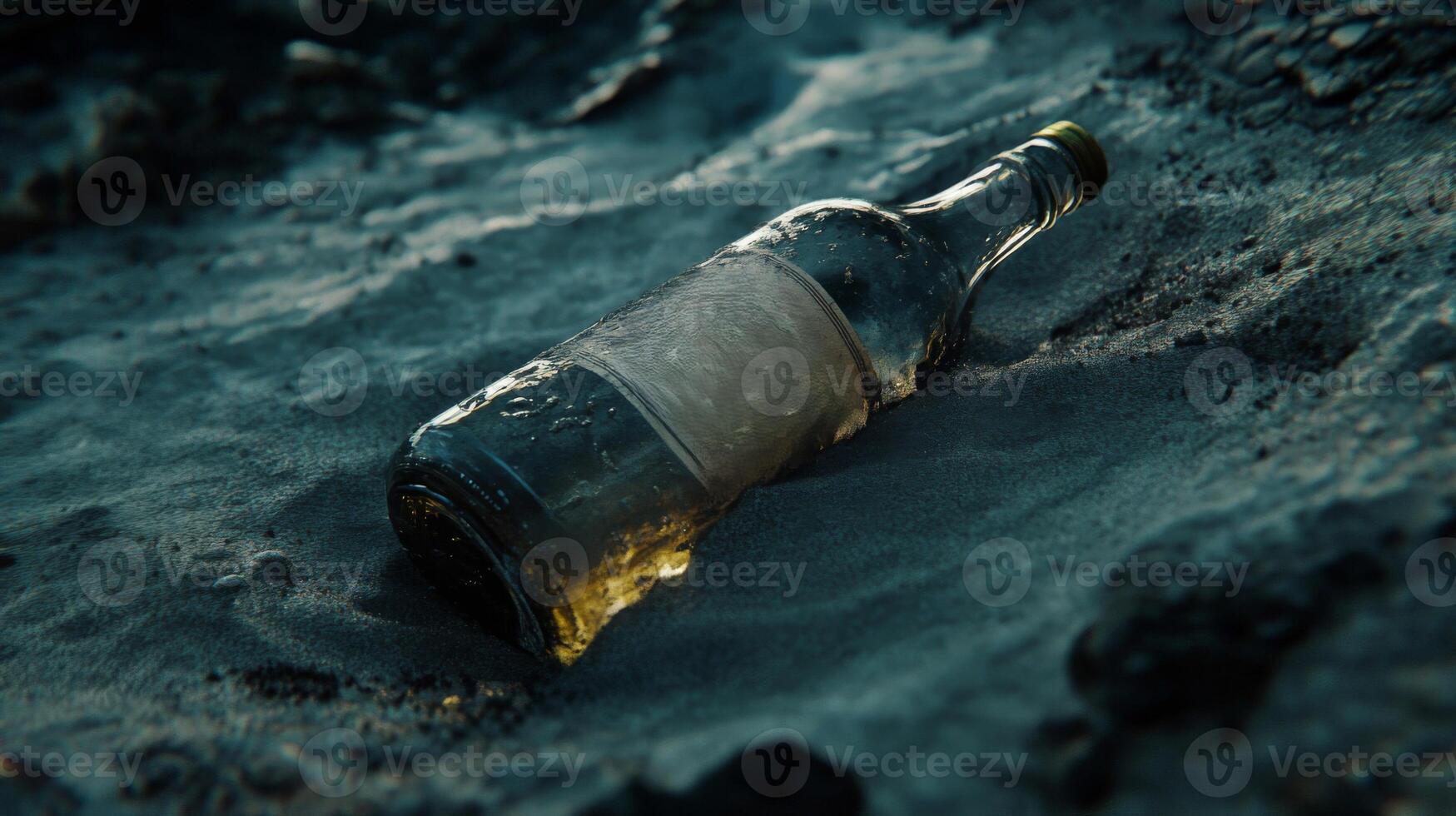 Dark Glass Bottle in Sand photo
