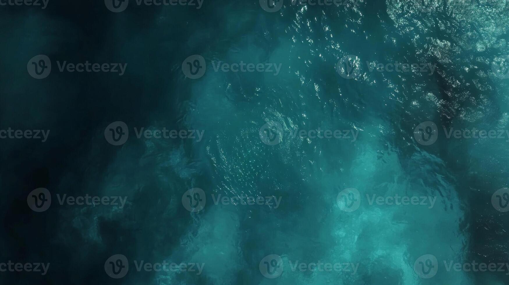 Person Swimming in Dark Teal Water Aerial View photo