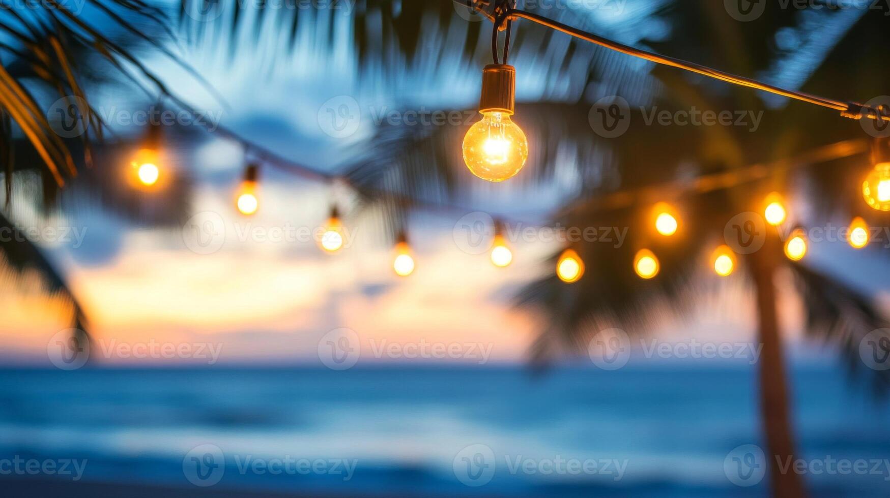 Warm Yellow String Lights at Sunset Beach photo