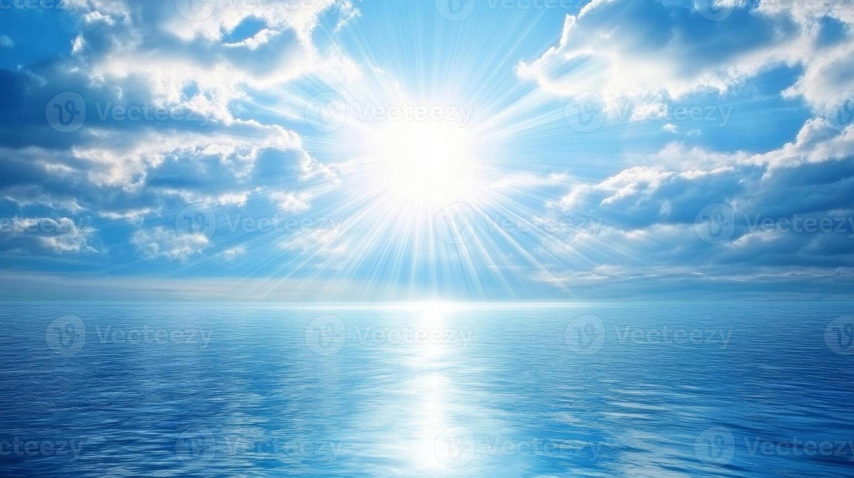 Bright Sun Over Calm Blue Ocean and Clouds photo