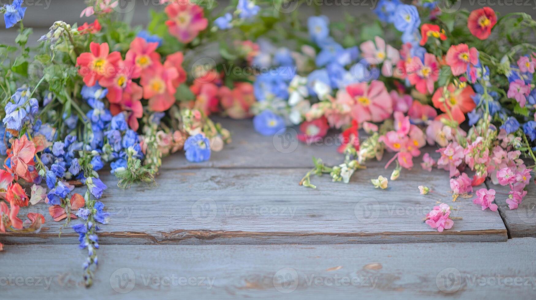 Colorful Flower Arrangement on Rustic Wooden Background photo