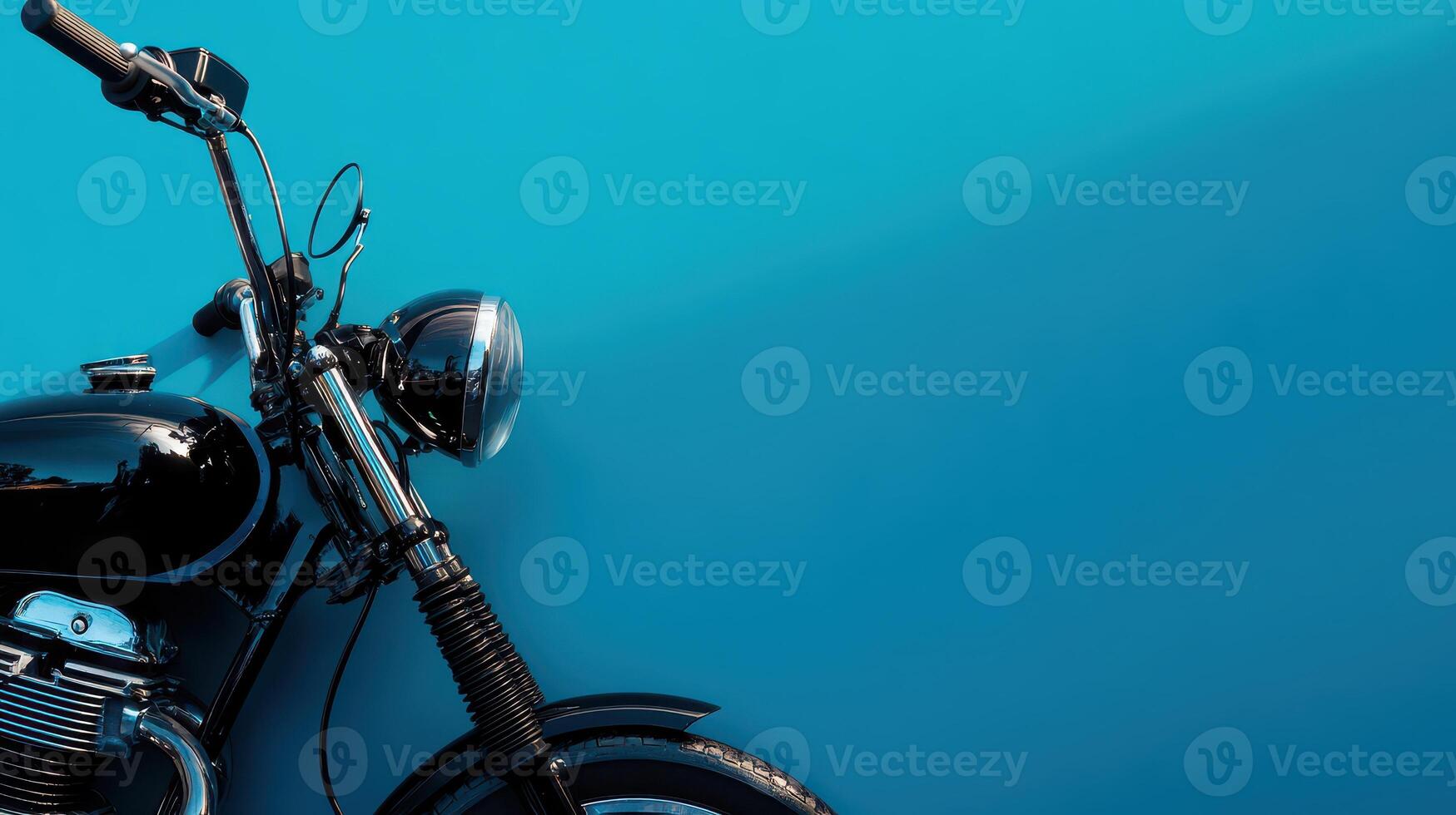 Classic motorcycle alongside a vibrant blue wall photo