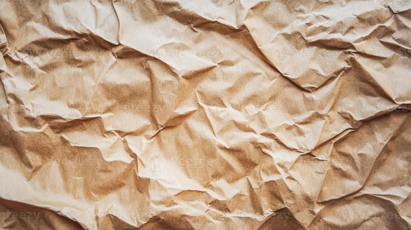Unique patterns on crumpled brown paper photo