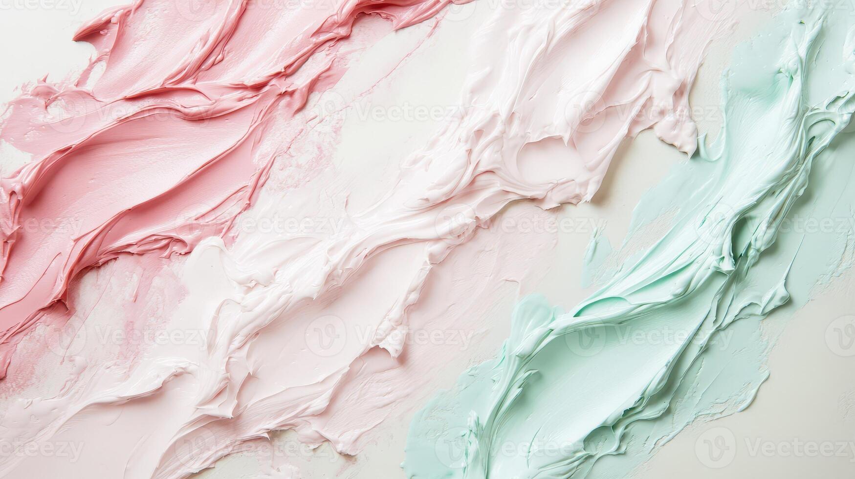 Colorful creams spread across a white surface photo
