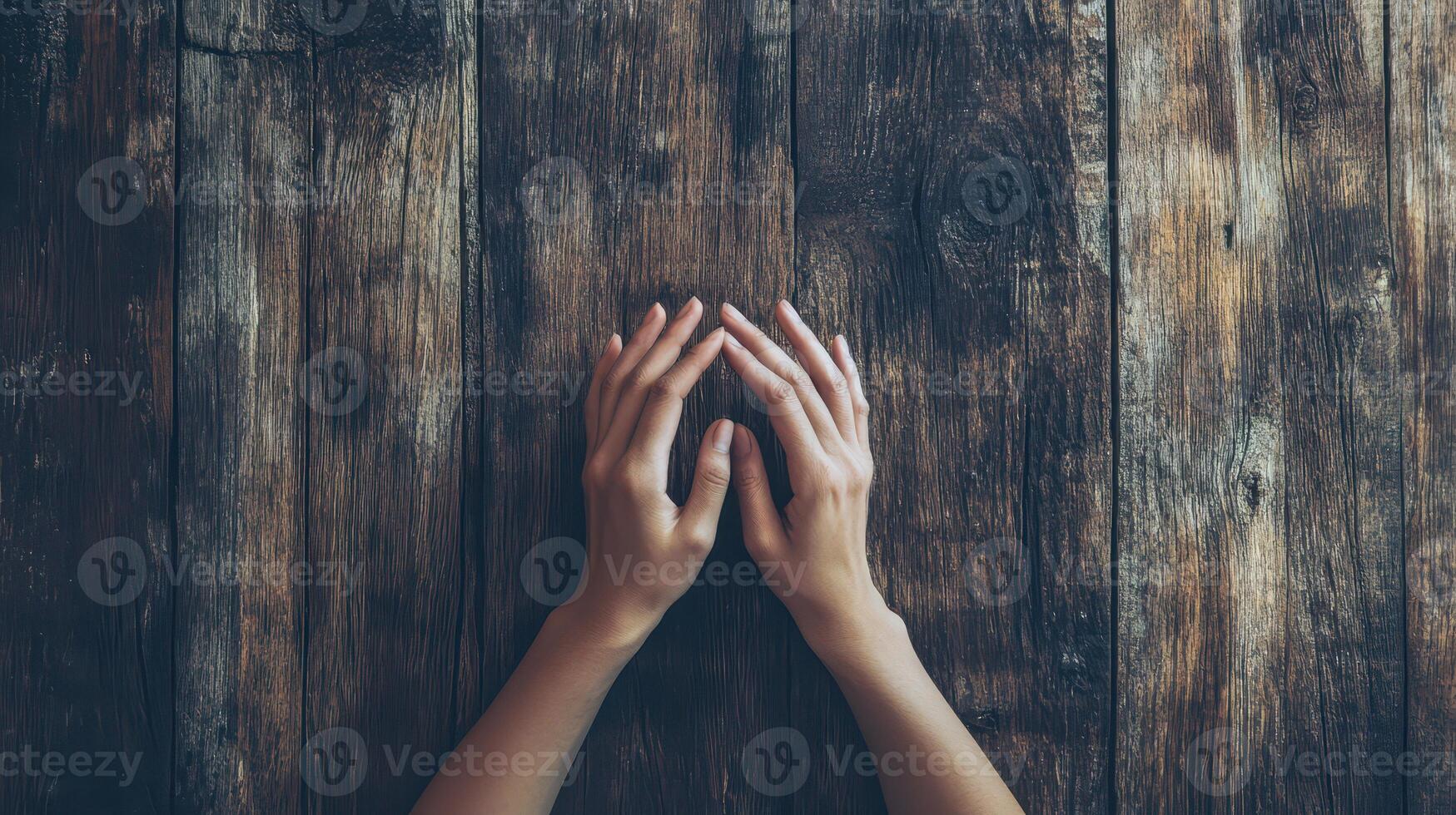 Hands on wood during reflection photo