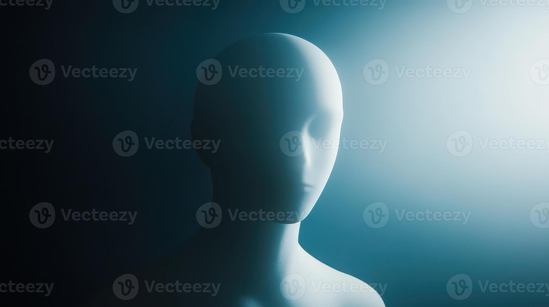 Silhouette of a mannequin against a soft blue glow photo