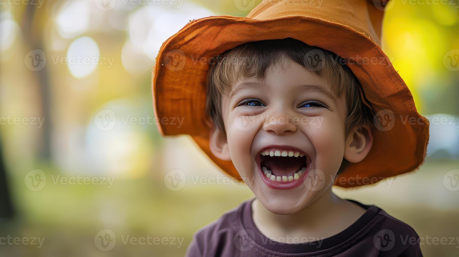 Child enjoying outdoors while wearing a fun hat photo