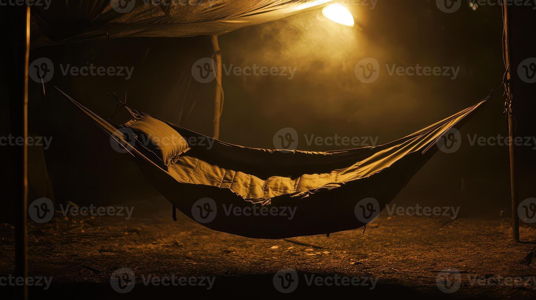 Cozy hammock under soft light during night camping photo