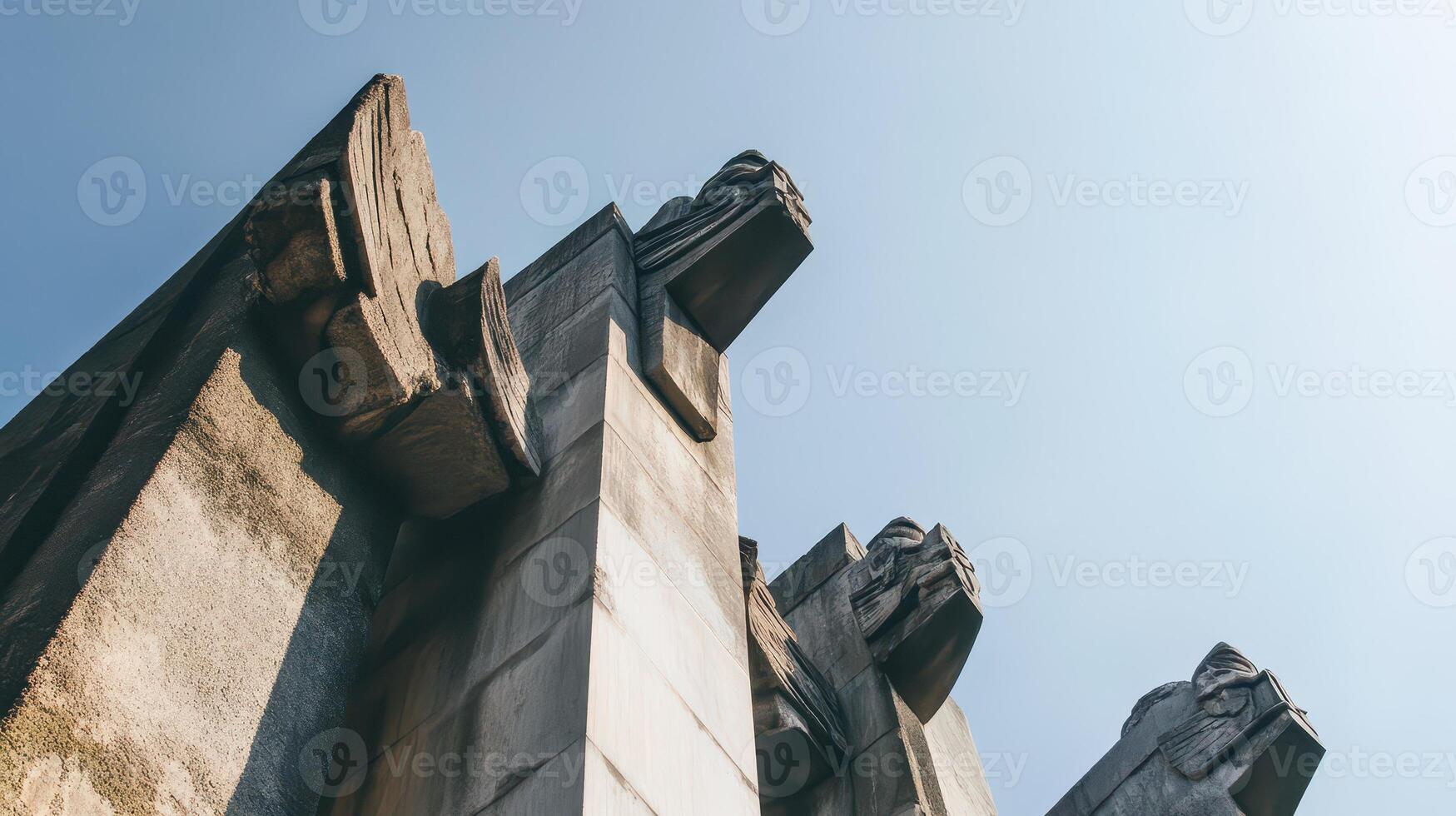 Stone sculptures at a clear sky monument photo