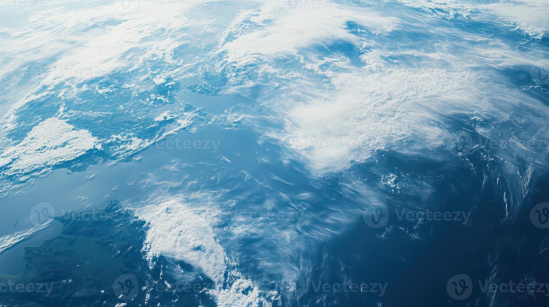 Vast ocean and cloud formations from high altitude photo