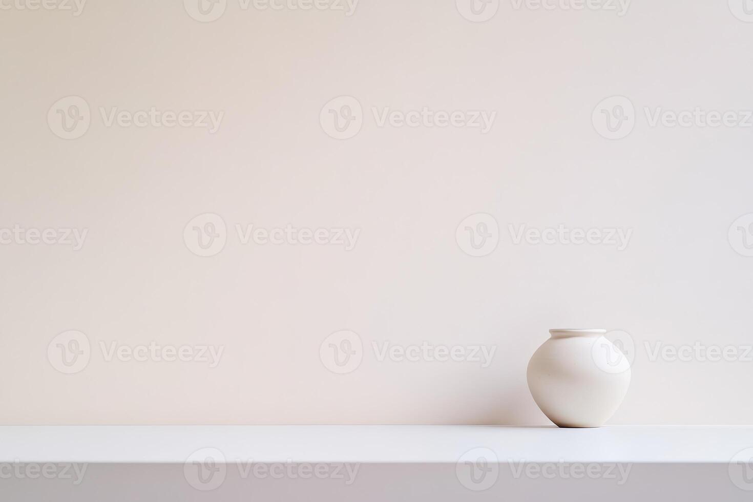 Simple ceramic vase in minimalistic setting photo