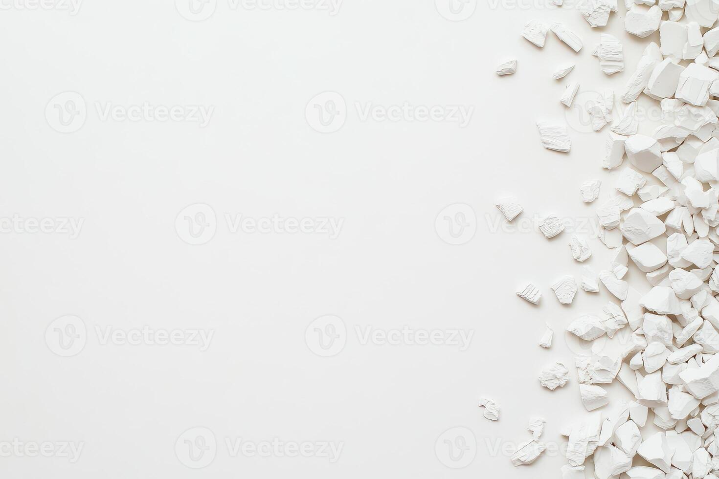 Chunks of white material scattered on a surface photo