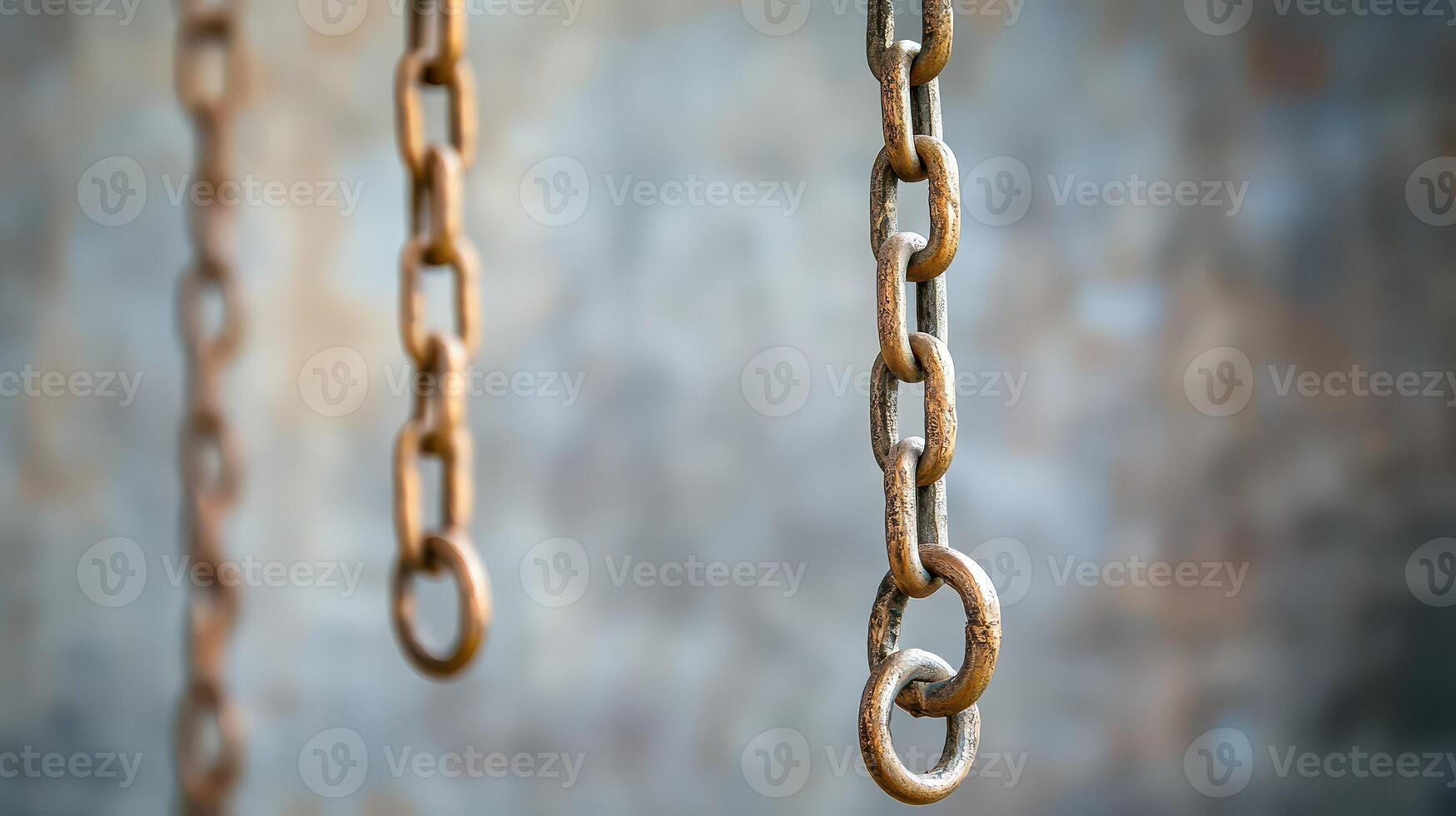 Rusty chains on a textured backdrop photo
