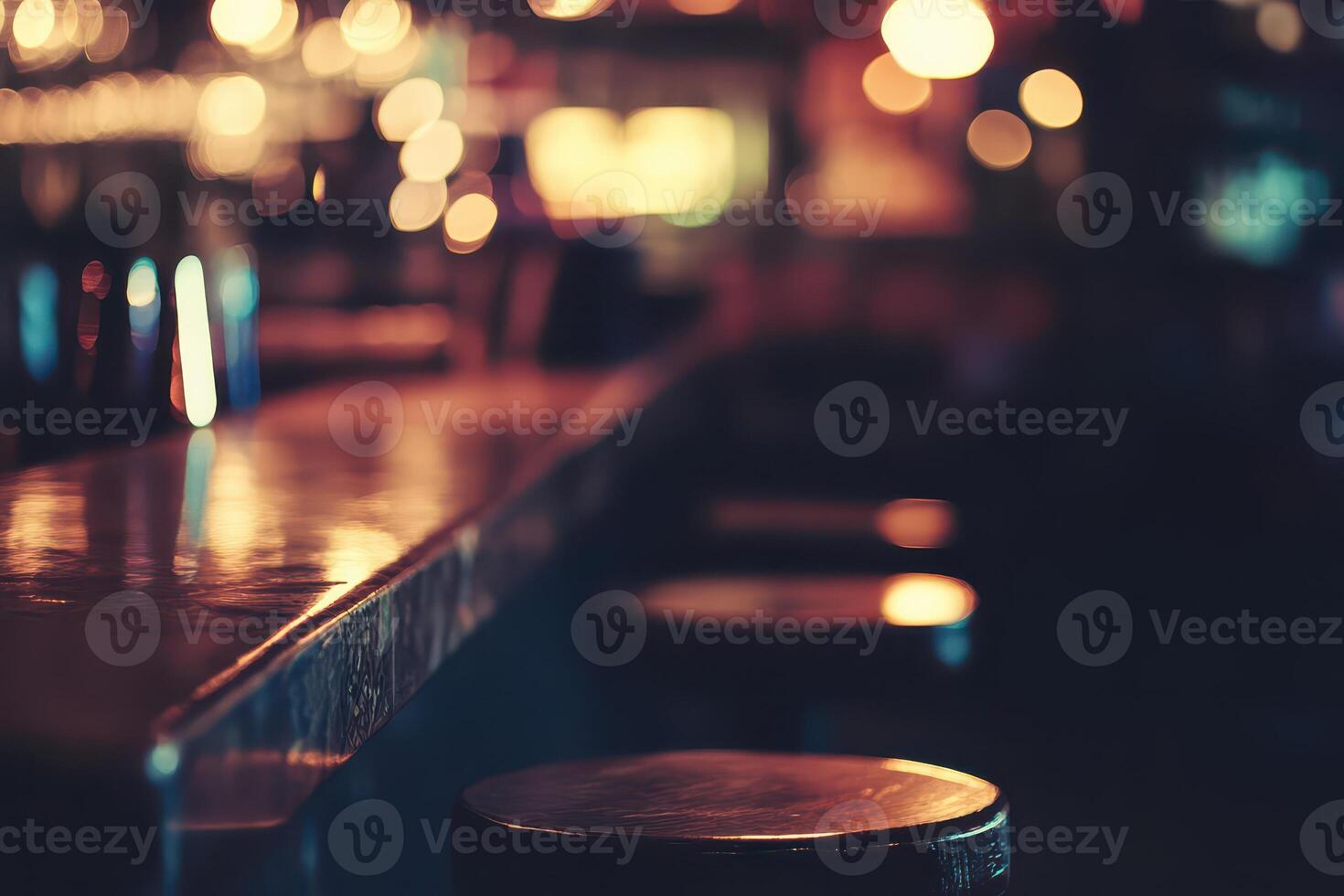 Bar interior with glowing lights and empty stools photo