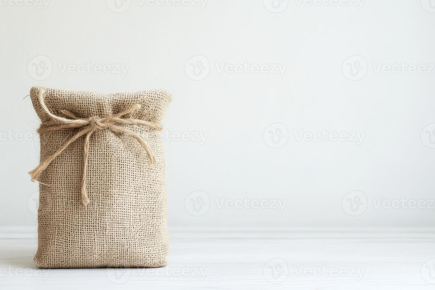 Natural burlap bag on a clean white background photo
