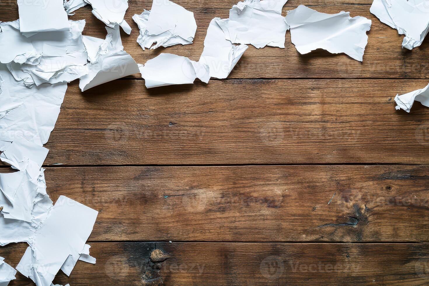 Crumpled paper on textured wooden surface photo