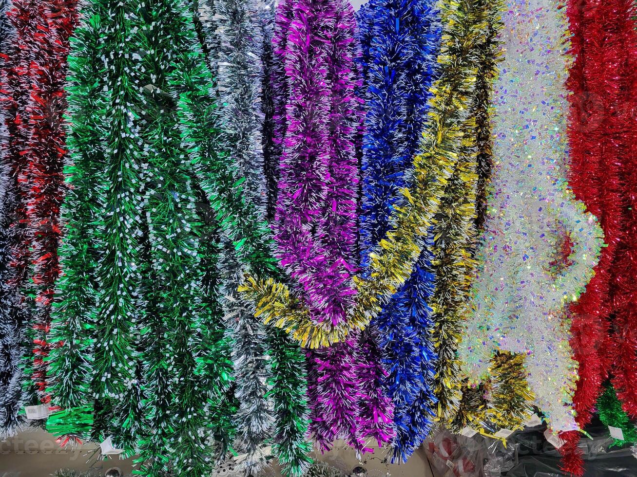 Colorful and varied fluffy New Year's tinsel. Background and tinsel photo
