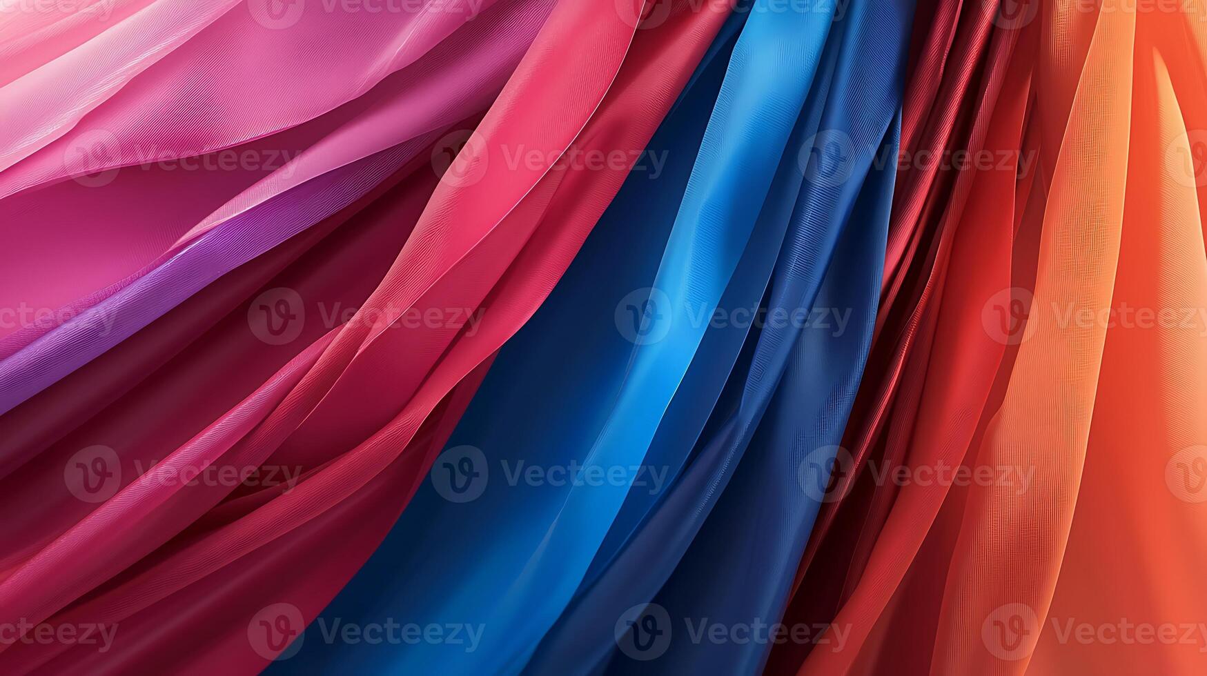 Colorful flowing fabric draping in vibrant hues creating a dynamic visual texture photo