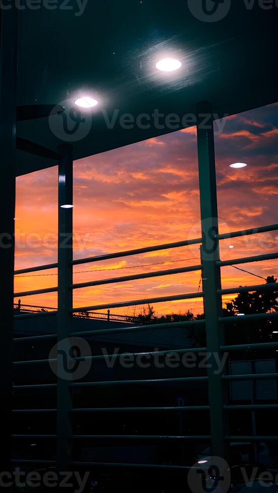A view of a sunset from a balcony photo