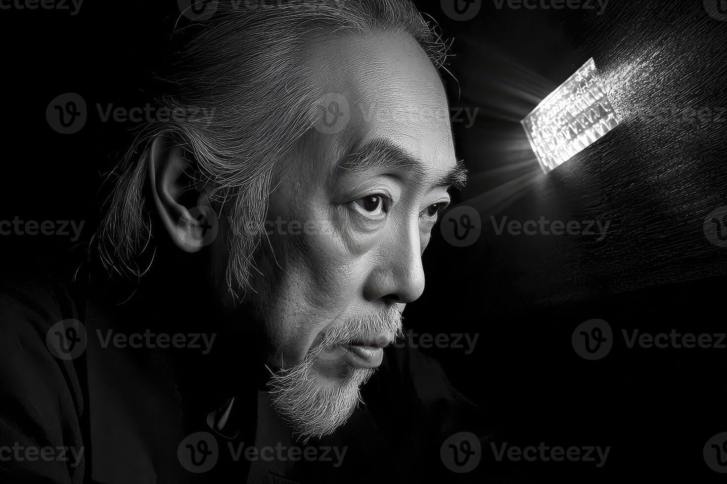 Pensive Elderly Man in Black and White Portrait with Glowing Element photo