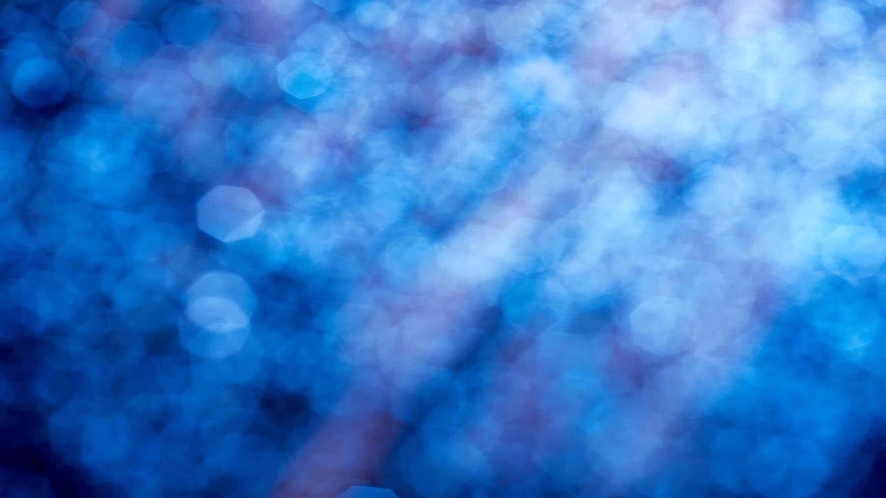 Blue bokeh abstract background with blurred light photo