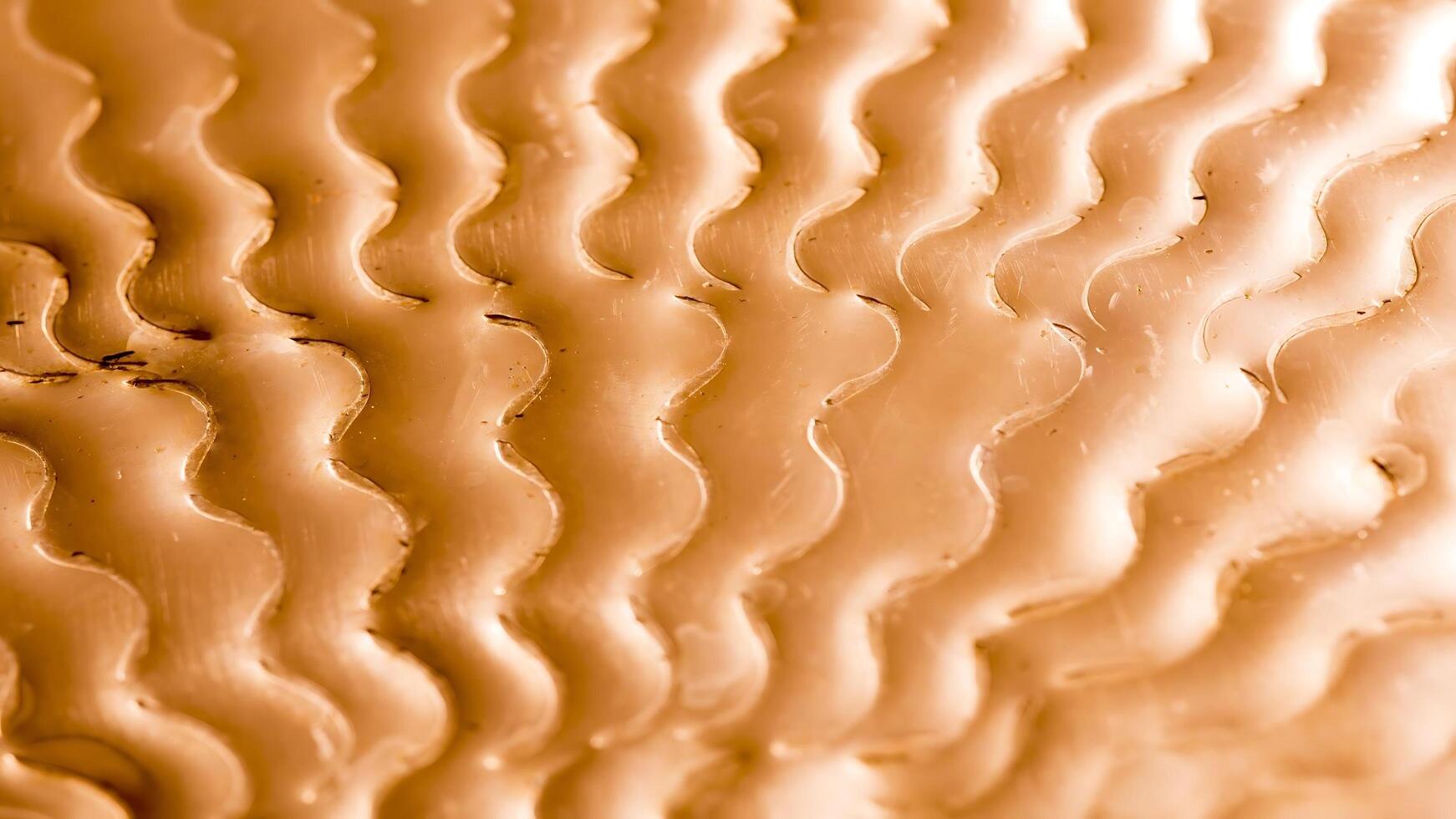 A close up of a wavy pattern on a surface photo
