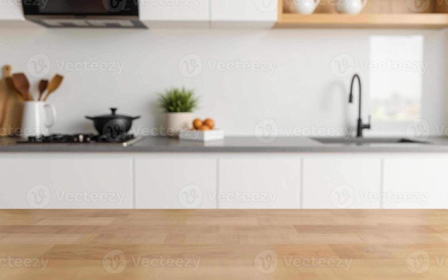 Empty maple kitchen island surface with blurred utensils and white cabinets in background, Perfect for cooking product placement photo