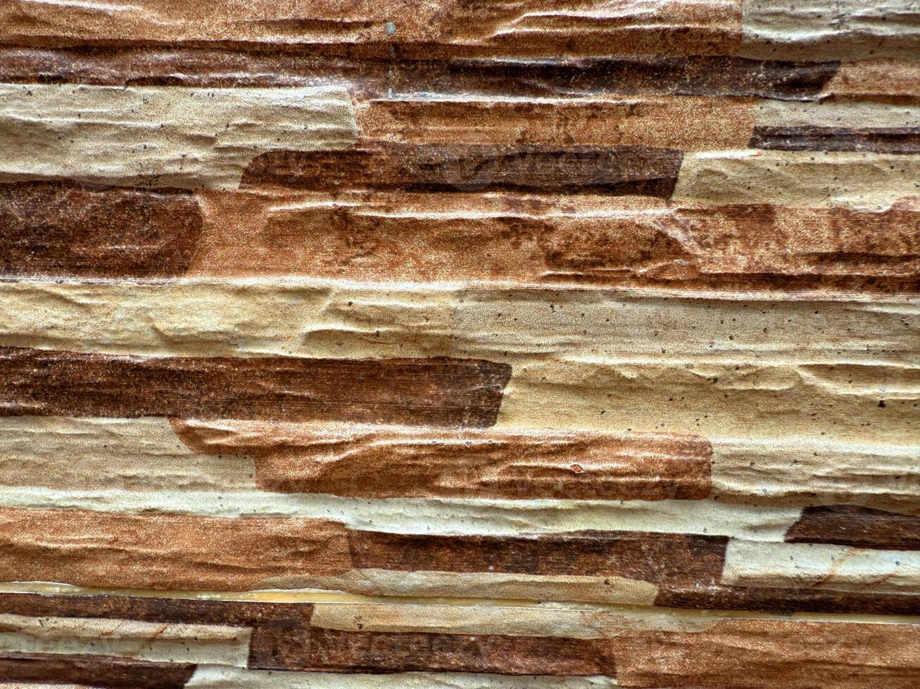 Textured Stone Wall with Layered Tones photo