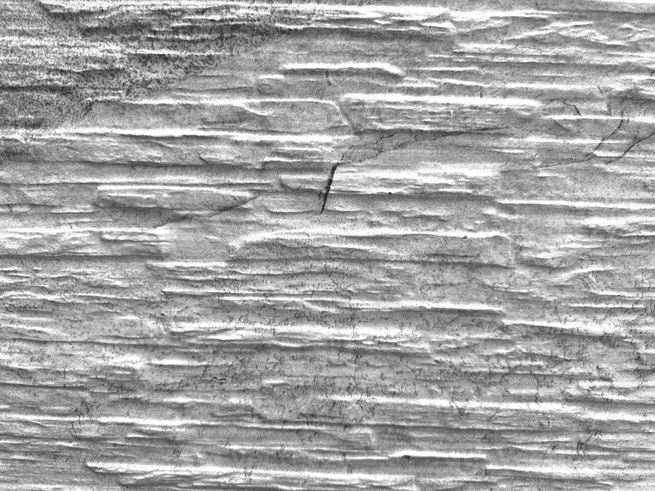 Textured Stone Wall with Horizontal Layers photo