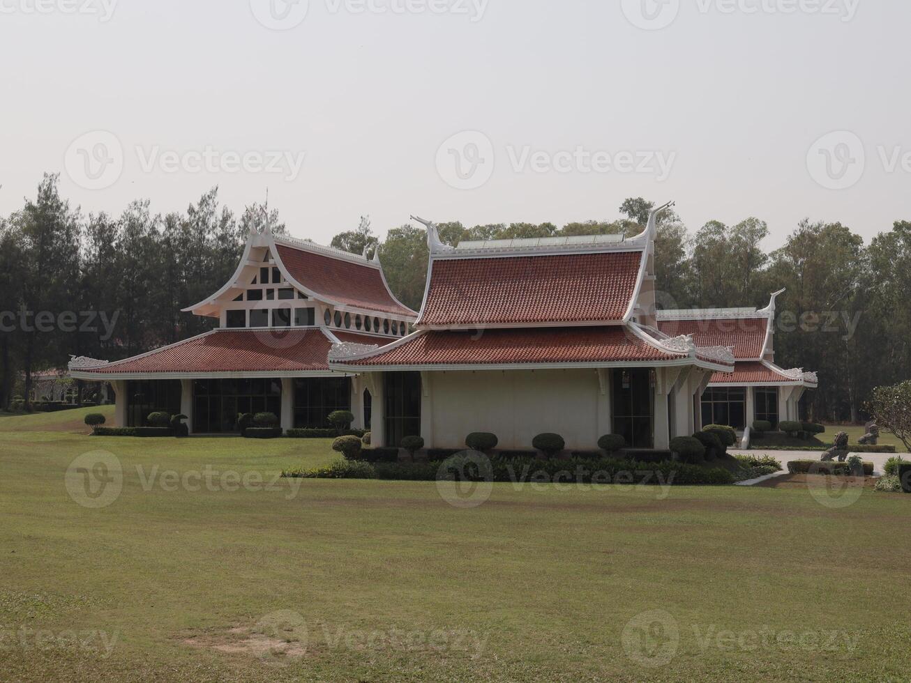 Stunning ThaiStyle Architecture Enveloped by Beautiful and Lush Greenery All Around photo