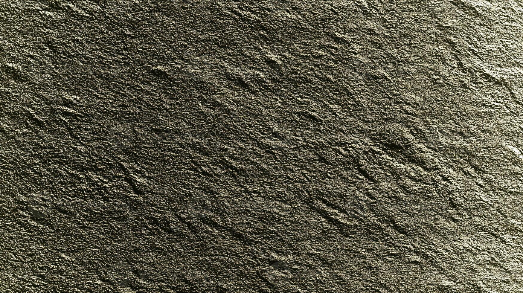 Textured backdrop presents a rough surface ideal for eco-themed designs and templates, offering free space for creative additions. photo