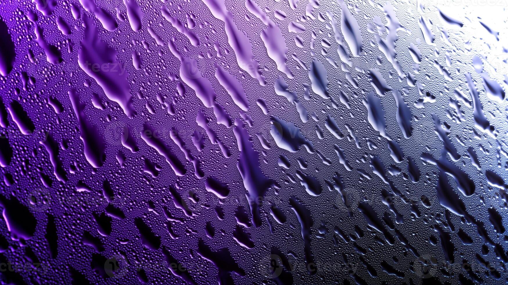 Raindrops cling to a glass surface, forming intricate patterns against a moody purple backdrop, creating an ideal texture for design purposes. photo