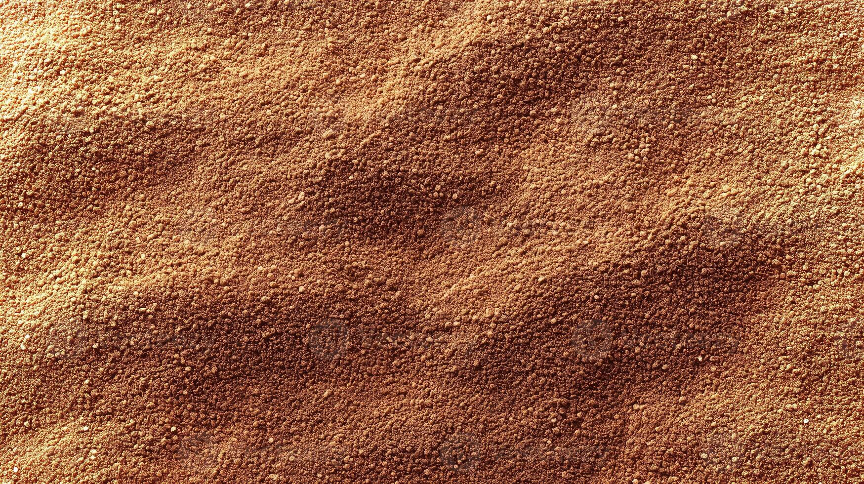 The textured backdrop features warm brown tones resembling soil or natural materials, creating ample empty space for design elements or text placement. photo
