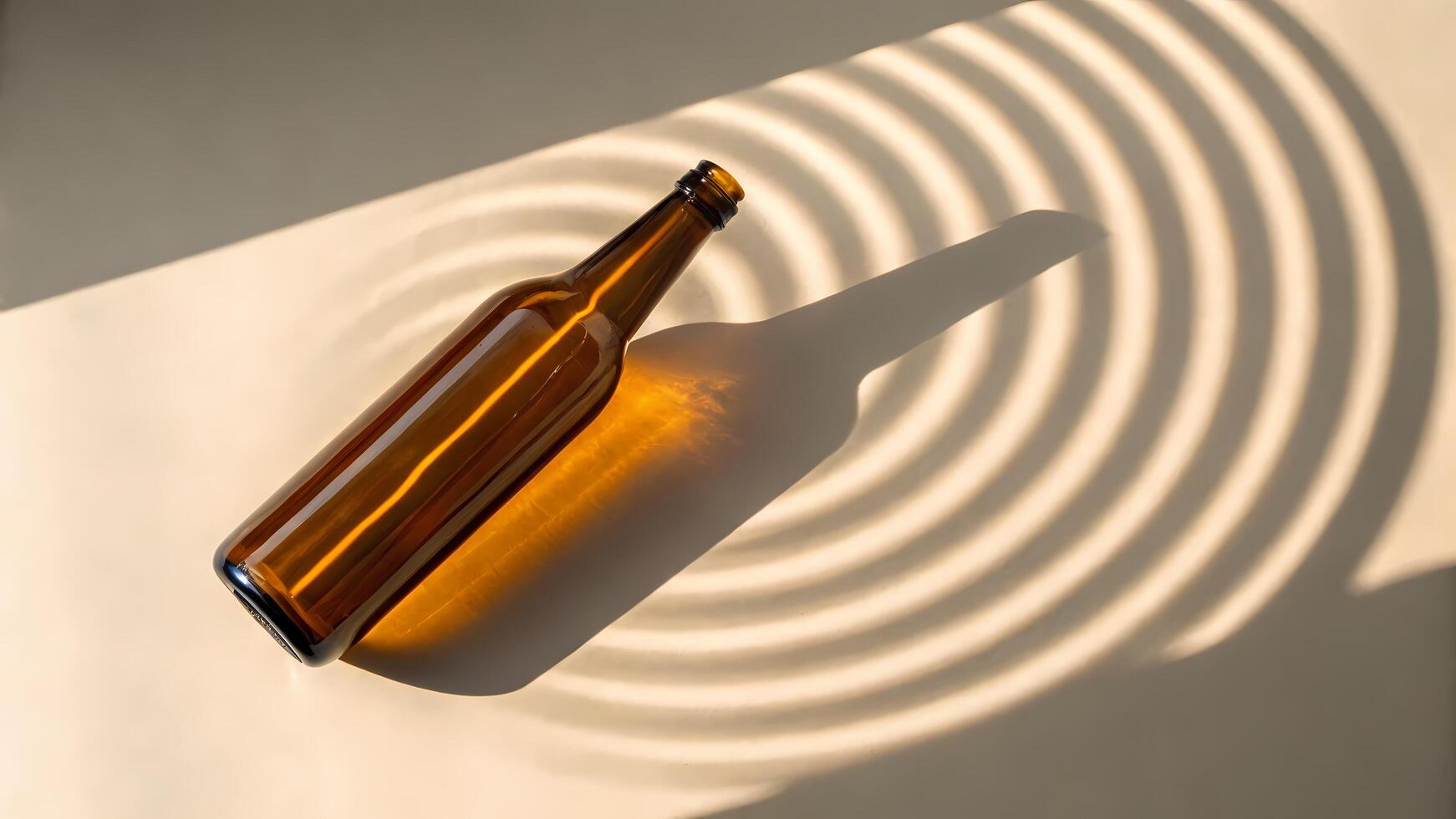 Glass Bottle with Sunlight and Shadow Pattern on Beige Surface photo