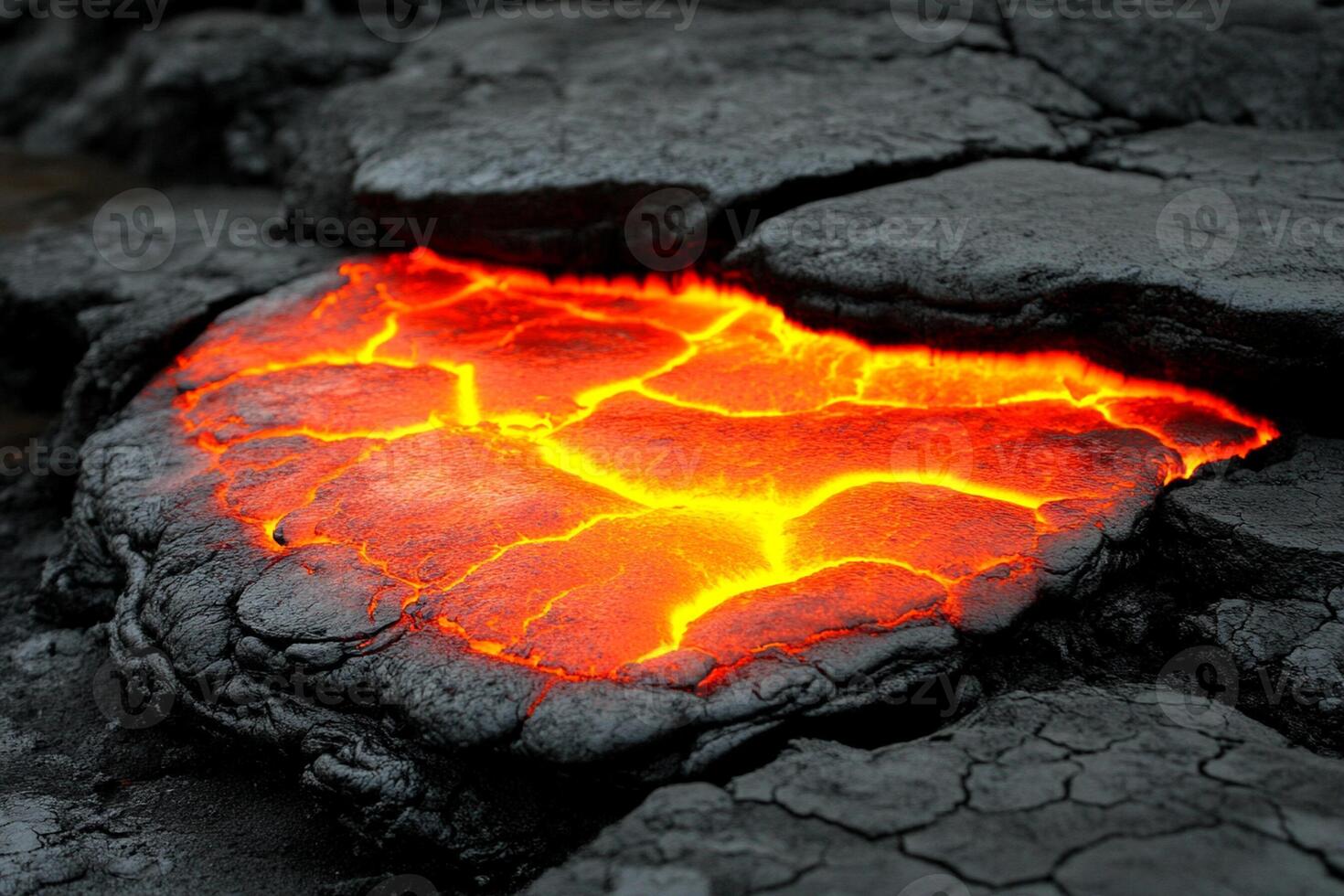 A lava flow is shown in the middle of a black rock photo