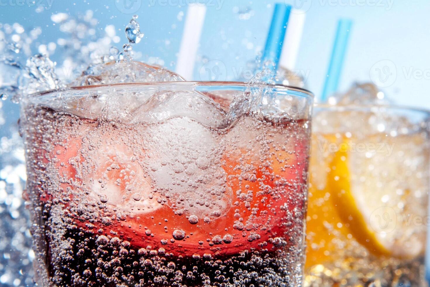 Two glasses of soda with ice and lemon slices photo