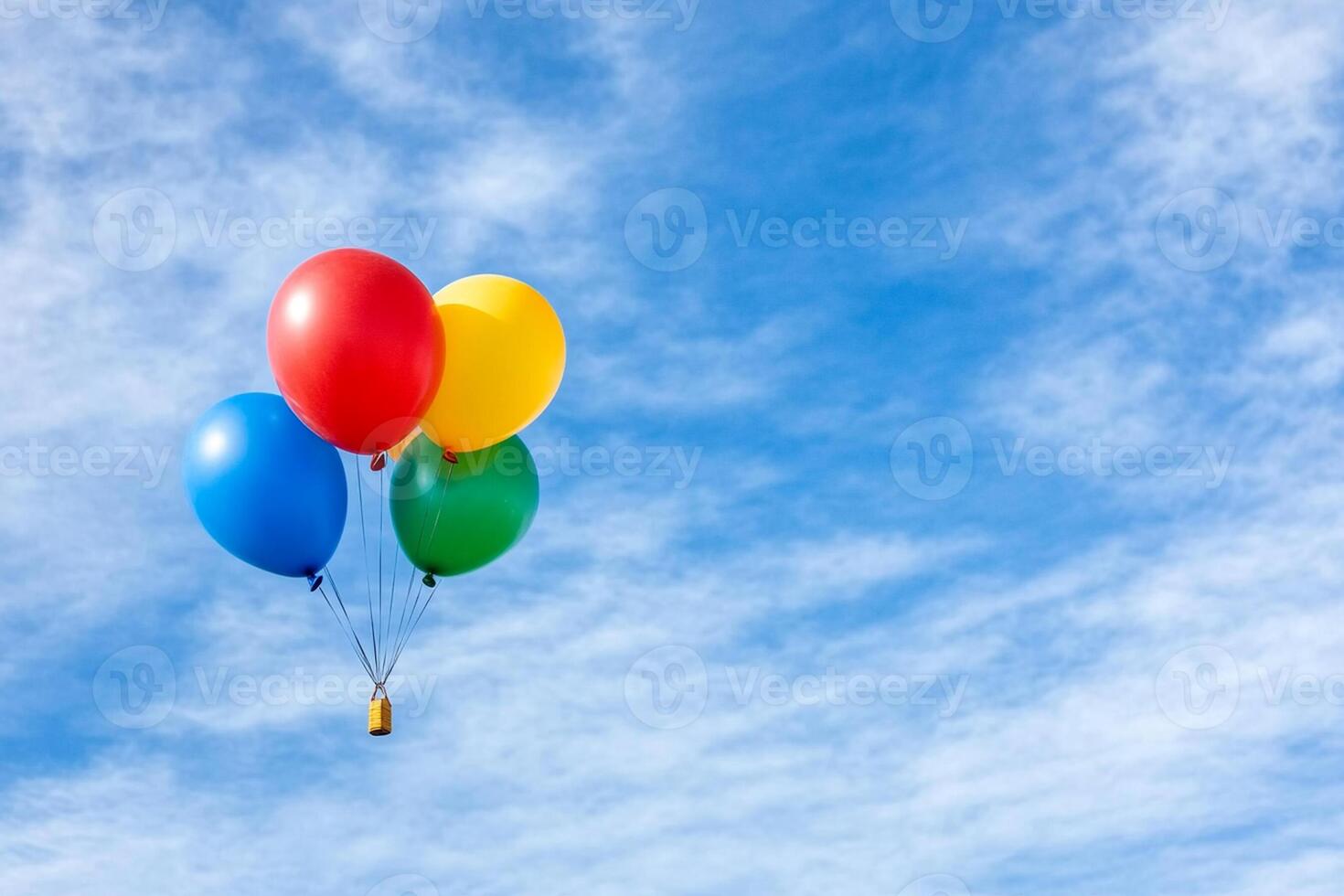 Colorful balloons flying in the blue sky photo